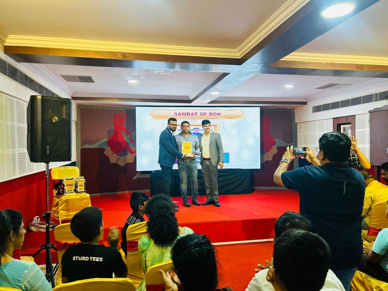 Certificate of appreciation presentation from Tata AIA