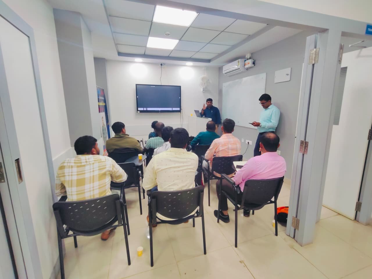 Sukhi Secure Solutions advisor team at a company gathering
